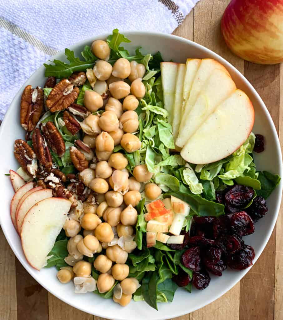 sriracha tahini dressing over autumn chopped salad