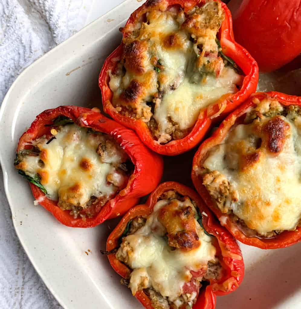 pesto chicken and quinoa stuffed peppers