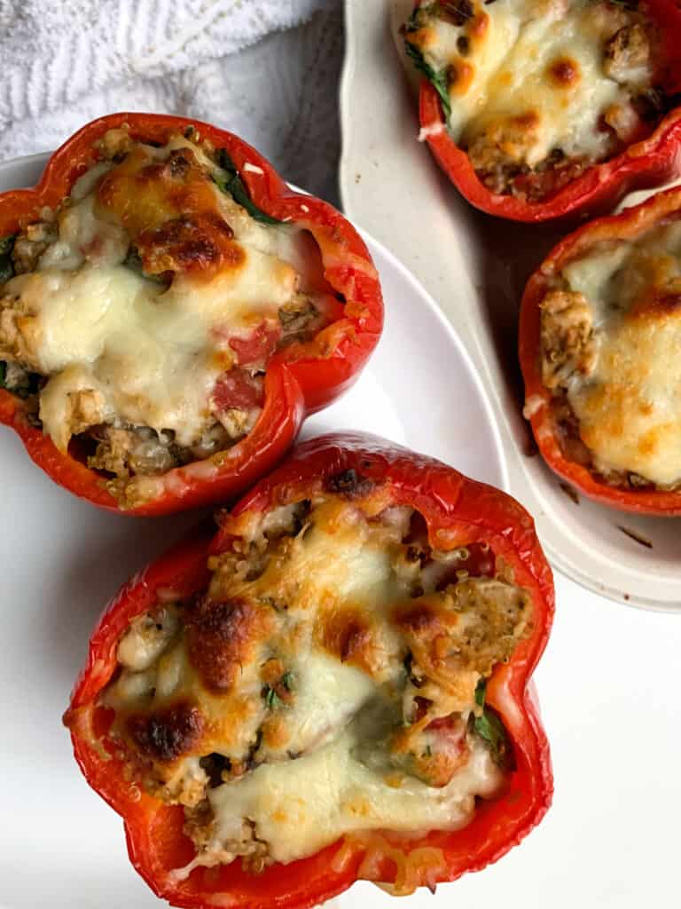 pesto chicken and quinoa stuffed peppers