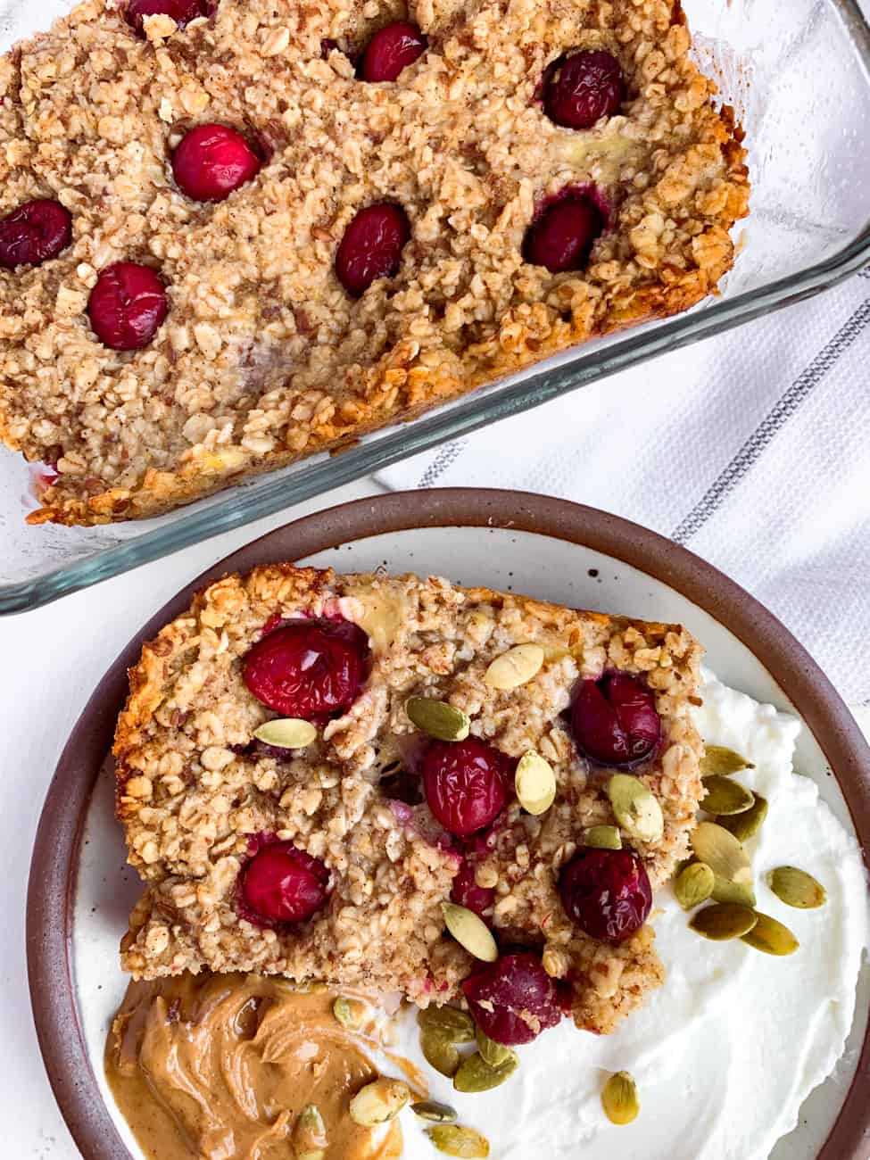piece of cranberry orange baked oatmeal with toppings
