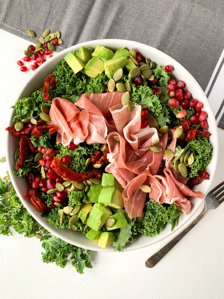 prosciutto and pomegranate kale salad